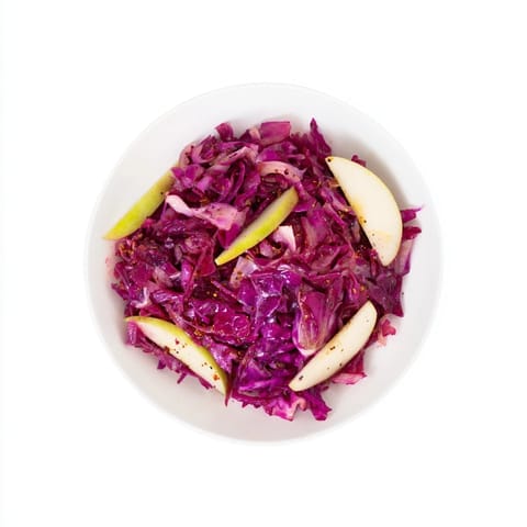 Tangy Sweet & Sour Bavarian Red Cabbage and Apple: showing a skillet of vibrant, steaming red cabbage.