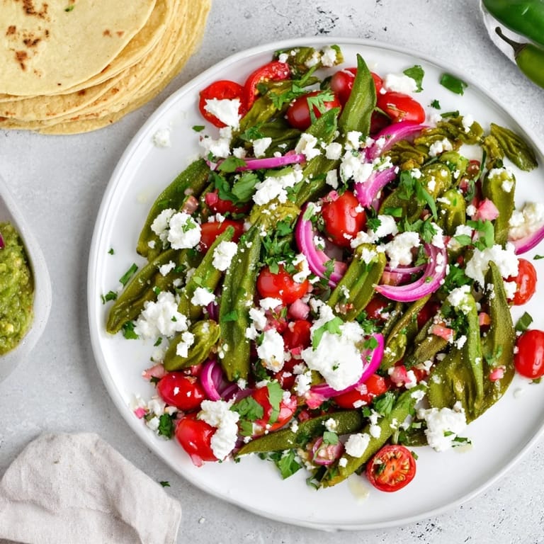 This close-up shot of a loaded Desert Cactus Taco Platter shows textures from fresh ingredients.